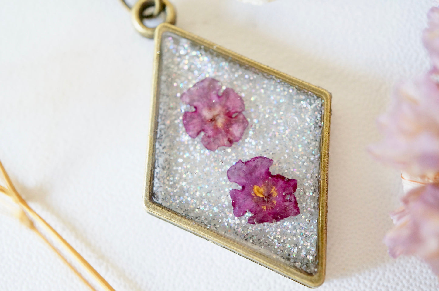 Real Pressed Flowers in Resin, Bronze Necklace in Purple and Iridescent Glitter