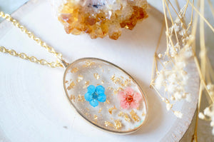 Real Pressed Flower and Resin Necklace Gold Oval in Blue Pink and Gold Foil Flakes