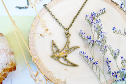 Real Pressed Flowers in Resin, Bronze Bird Necklace in Yellow and Light Pink