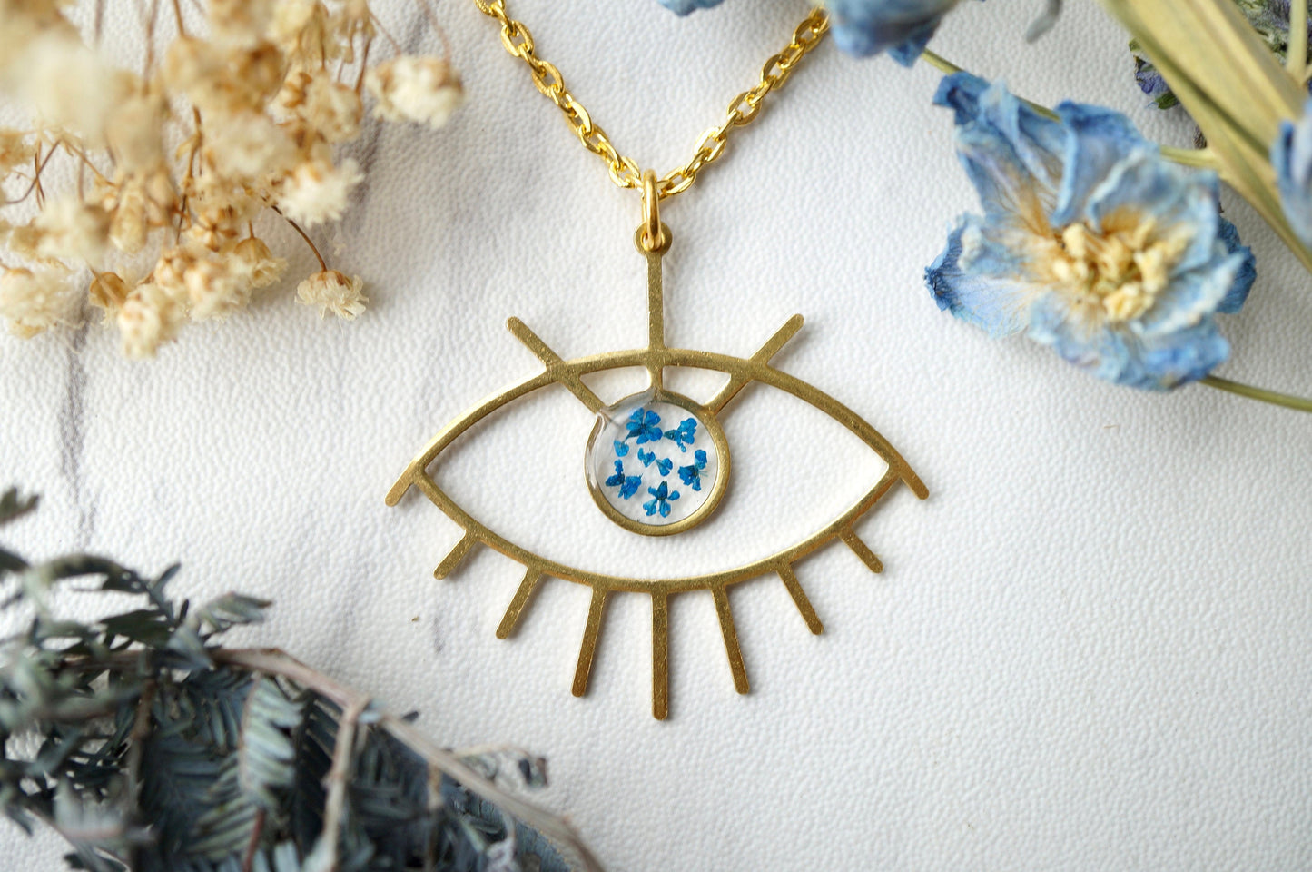 Real Pressed Flowers in Resin, Gold Necklace, Brass Eye in Blue