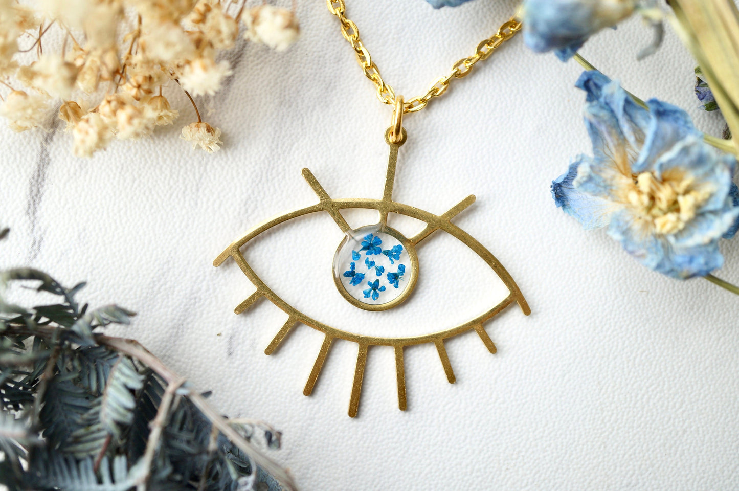 Real Pressed Flowers in Resin, Gold Necklace, Brass Eye in Blue