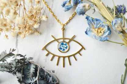 Real Pressed Flowers in Resin, Gold Necklace, Brass Eye in Blue