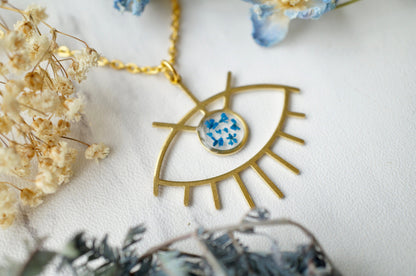 Real Pressed Flowers in Resin, Gold Necklace, Brass Eye in Blue