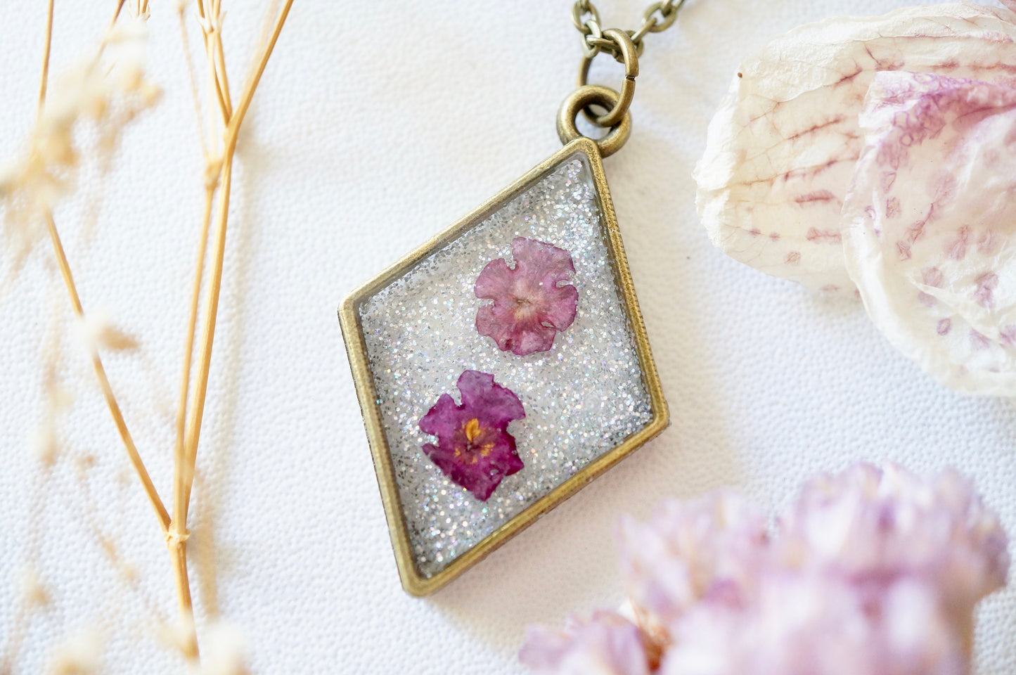 Real Pressed Flowers in Resin, Bronze Necklace in Purple and Iridescent Glitter