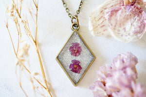 Real Pressed Flowers in Resin, Bronze Necklace in Purple and Iridescent Glitter